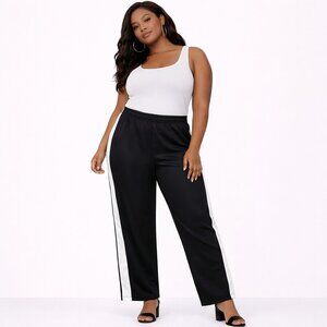 Lady Foot Locker women's black and white sweatpants Size: L